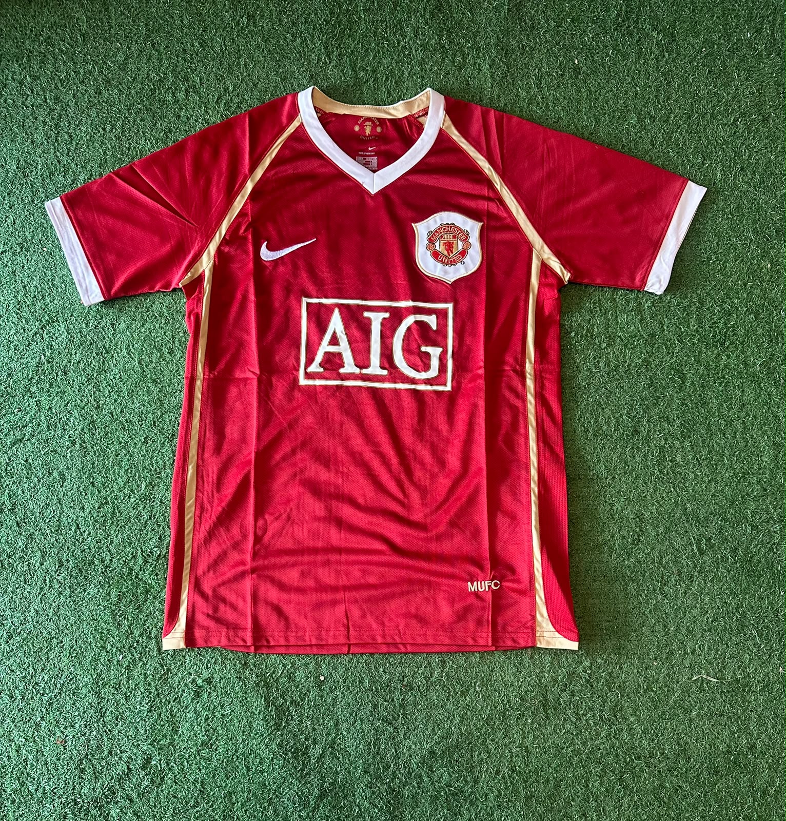 Camiseta retro Manchester United 2006/07 · titular roja · AIG